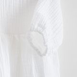 Dojčenské mušelínové šaty s dlhým rukávom New Baby Elizabeth biela 74 (6-9m)